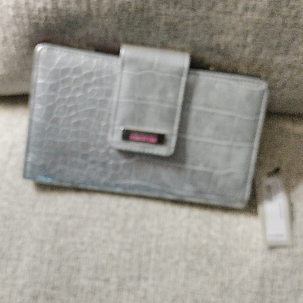 Kenneth Cole Reaction silver wallet 4.5 X 7.5 NWT and 3 zipper pockets